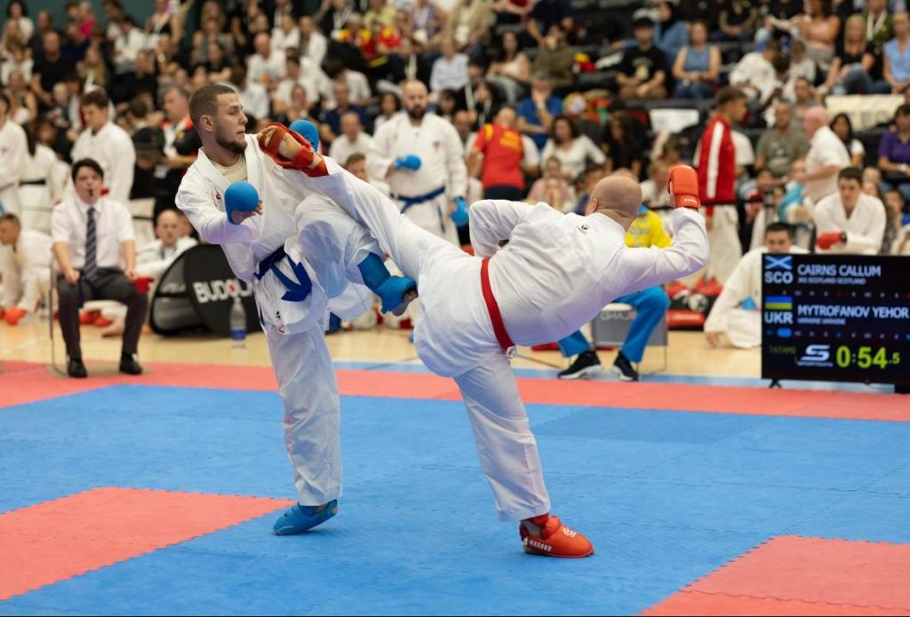 JKS Clyde instructor competing in kumite at a karate competition